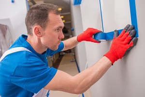 room painting by covering by blue paint tape