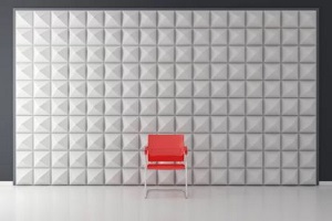chair with aucostic panels in wall