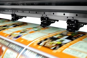 big printer printing restaurant menu