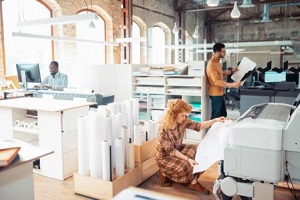 people working in digital printing factory