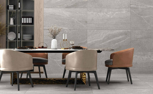 pleasing dining area with floor and custom wall covering with grey marble pattern
