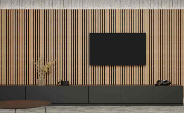 flat screen TV on acoustic wall art panel covered wall