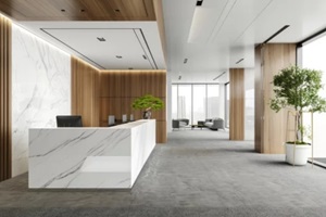 modern office interior with a white marble reception desk, wooden panel walls and a gray carpeted floor