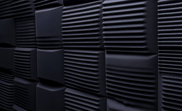 professional black foam pattern in an audio studio creates an ideal background for music production