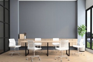 modern meeting room with conference table and chairs, gray slat wall and built-in wooden cabinet