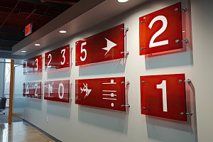 red Acrylic wall art red with numbers in airport