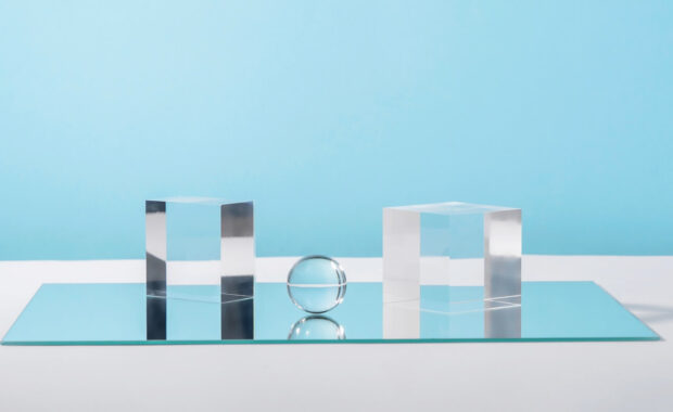 cosmetic display glass podium platform with stylish props for product presentation