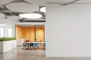 white and yellow office meeting room with blank wall