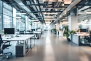 blurred modern open office interior for corporate business or call centre with blurred background